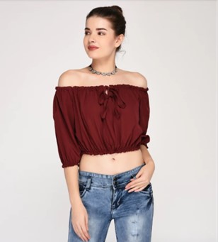 woman wearing an off the shoulder blouse