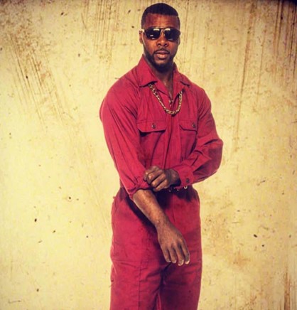 burgundy-jumpsuit-model-wearing-sunglasses-gold-chain