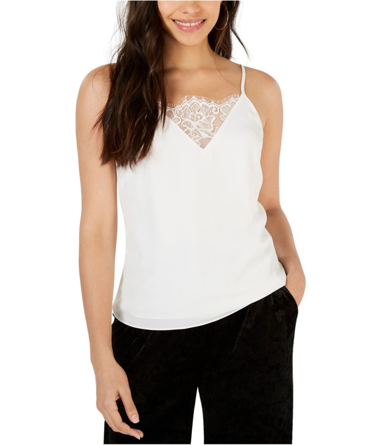 girl wearing a Stylish white lace tank with black skinnies