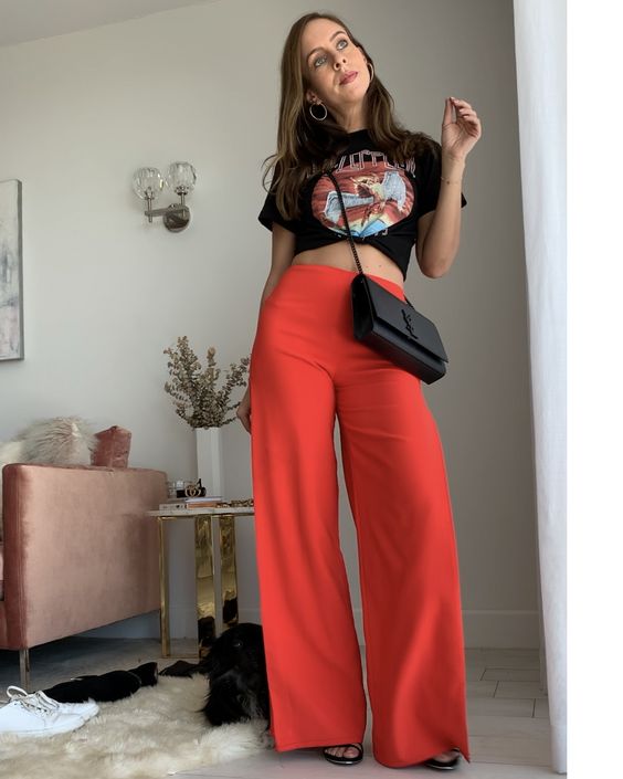 lady combines graphic tee with A  Pair Of Wide-Leg Pants