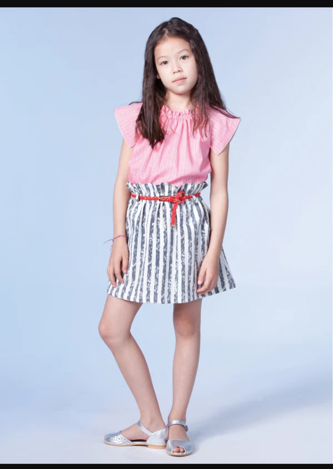 girl modes in stripped Anaïs and I skirt