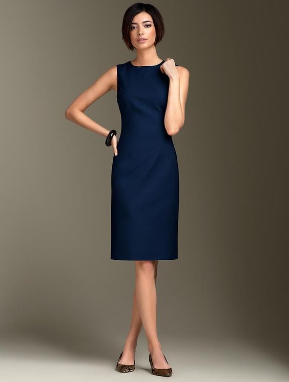 lady models in A Sheath Dress