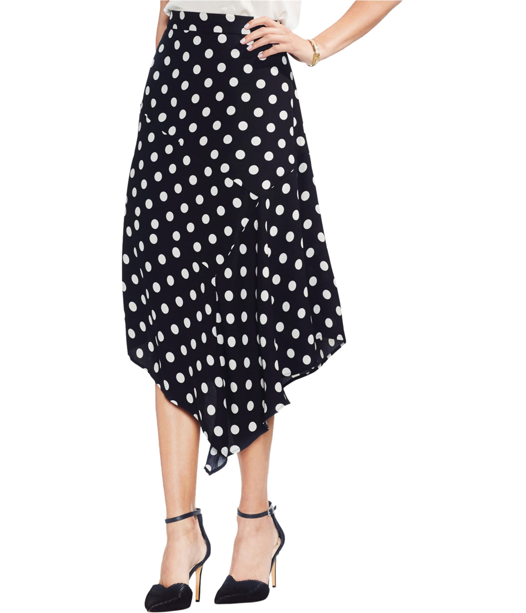 woman-wearing-black-polka-dot-asymmetrical-skirt