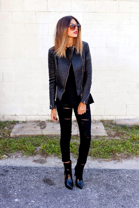 Black Ripped jeans plus a Printed Blazer and a White Top.