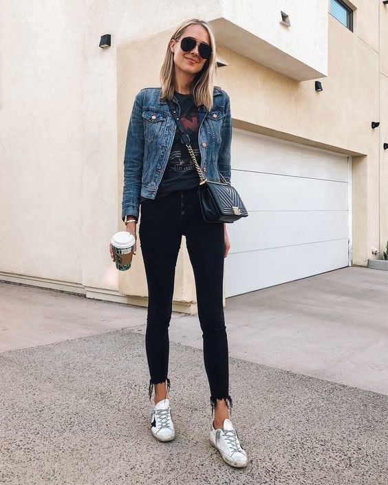 Frayed Edge Jeans Matched With A Graphic Tee and a Jacket