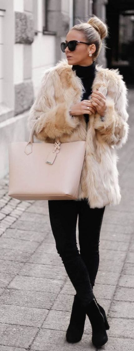 Lady models in brown faux fur 