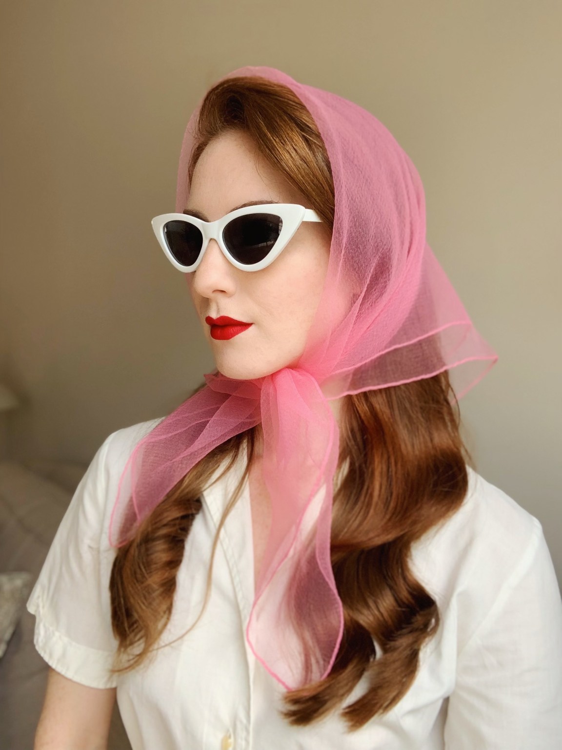 lady models in pink retro scarf