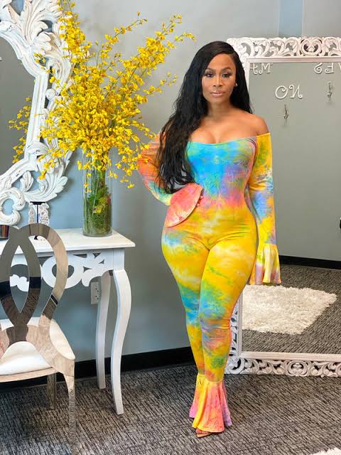 Lady models in colorful tie-dye jumpsuit