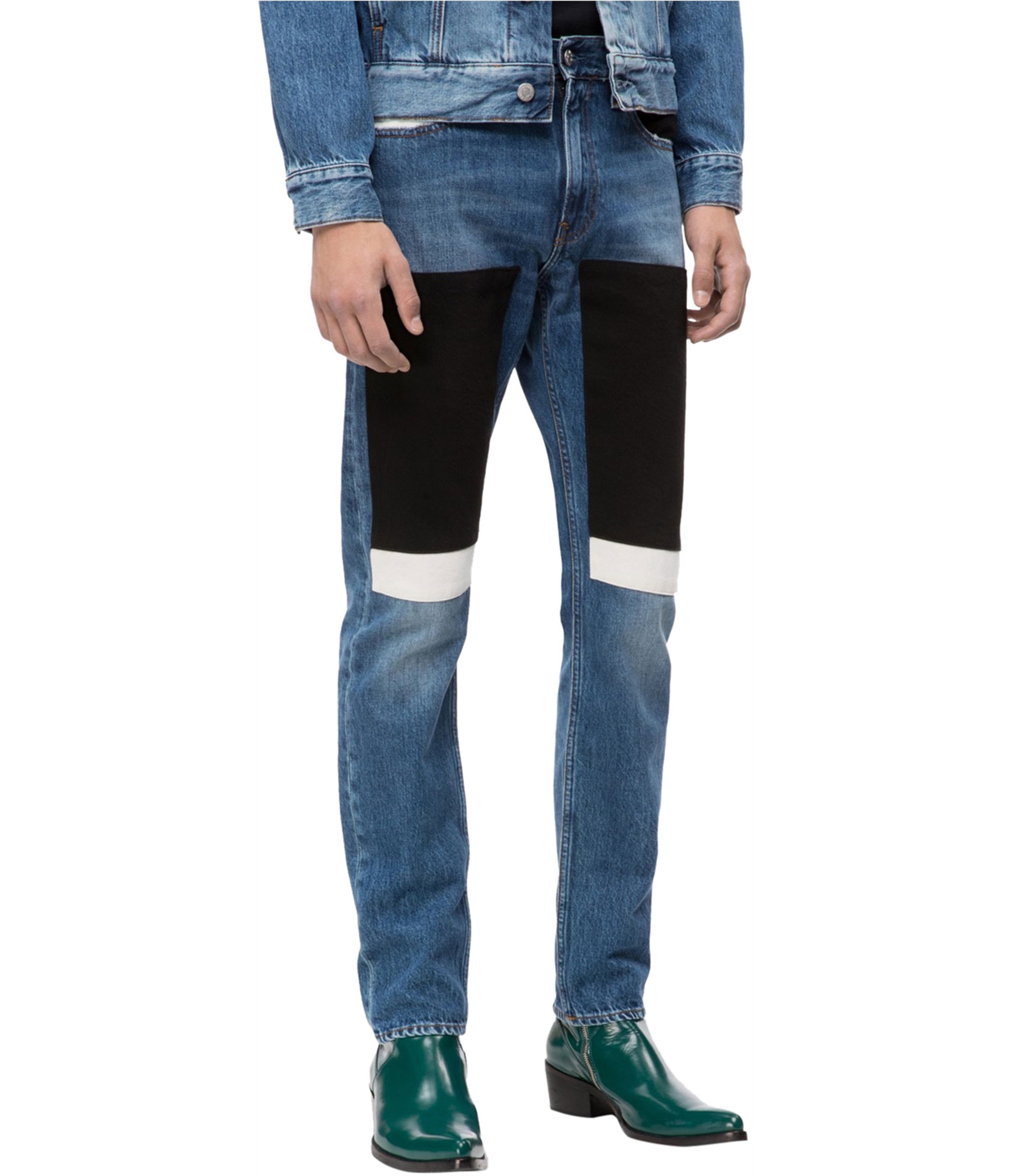 Man-wearing-patched-slim-fit-jeans